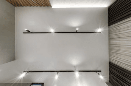 Contemporary suspended ceiling with integrated linear lighting